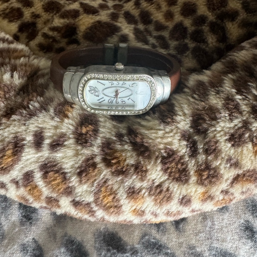 Brown clip on watch